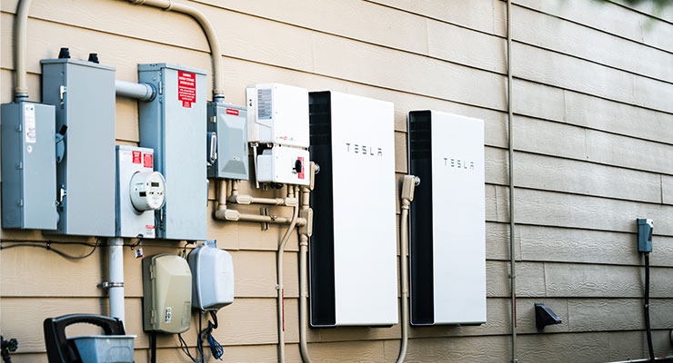 tesla batteries on wall