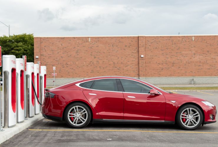 Tesla being charged, one of the three types of electric vehicles available