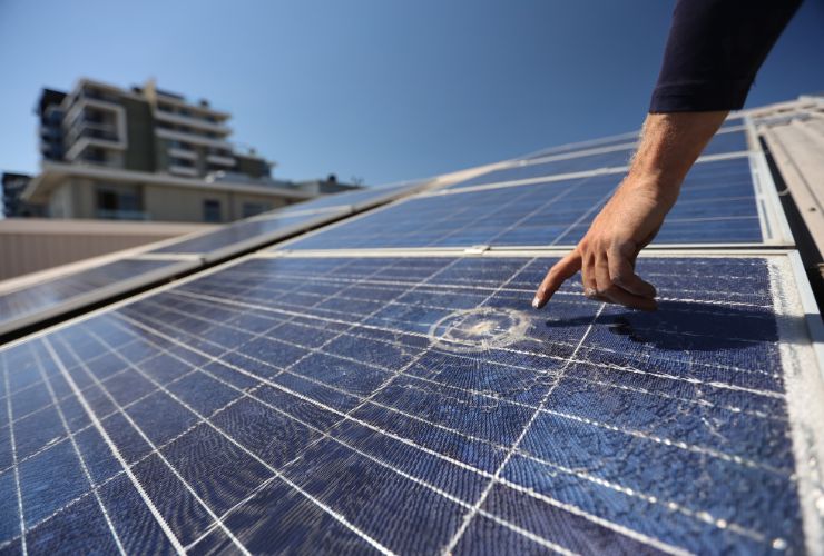 solar panel with damage from hail