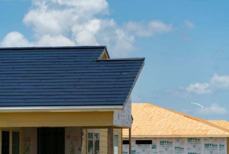 house with tesla solar roof tiles