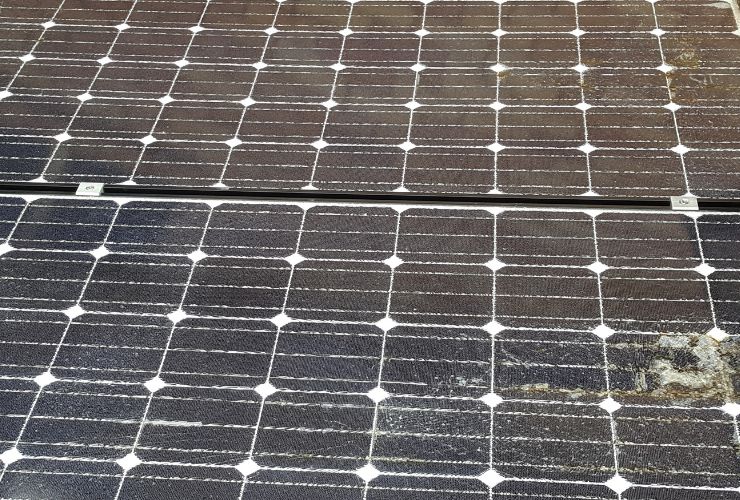 solar panels that have become damaged by cracking because of unfair business practice in solar