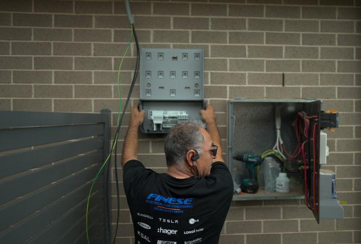 installer working on meter box