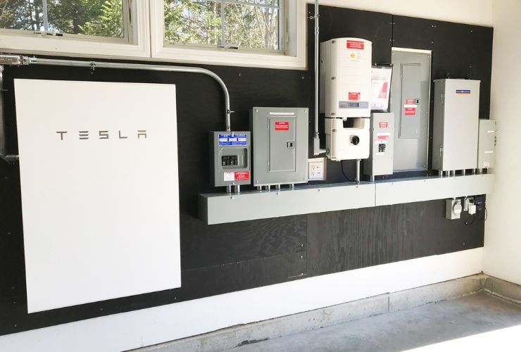 Tesla Powerwall on garage wall