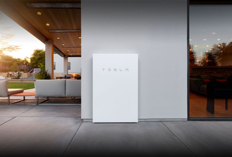 Tesla powerwall in front of home