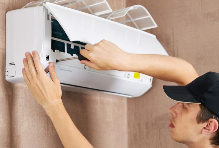 air conditioner being worked on so it doesn't affect the environment