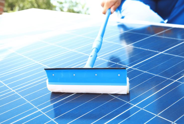 solar panel being cleaned