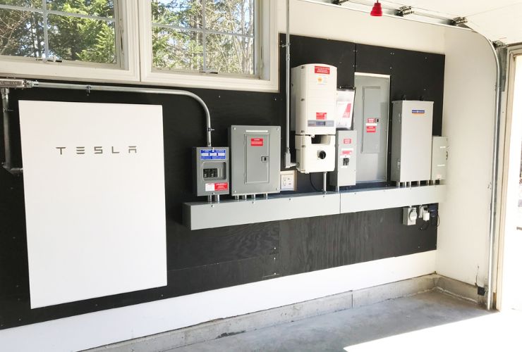 Tesla powerwall on garage wall