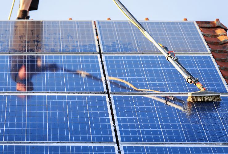 solar panels being cleaned