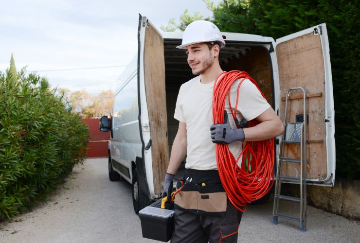 installer wearing in front of van and not subcontracted by a solar cowboy company