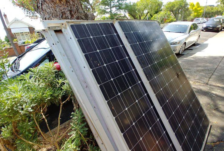 Broken solar panels laid out on top of each other, with a potential need for a warranty claim