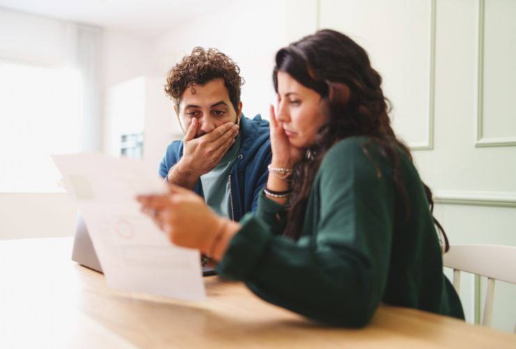 couple looking at solar system prices