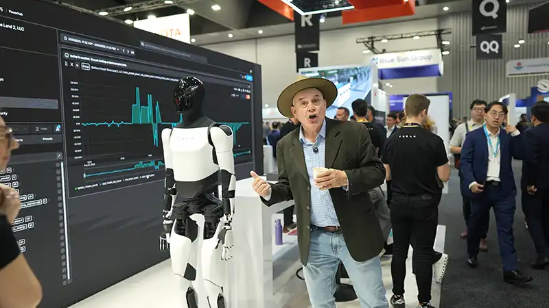 markus lambert with tesla robot